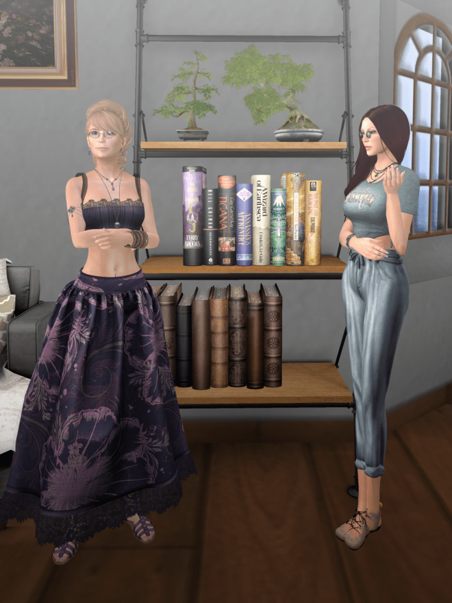 We move to the bookshelves, where she proudly shows me some first editions she's collected.